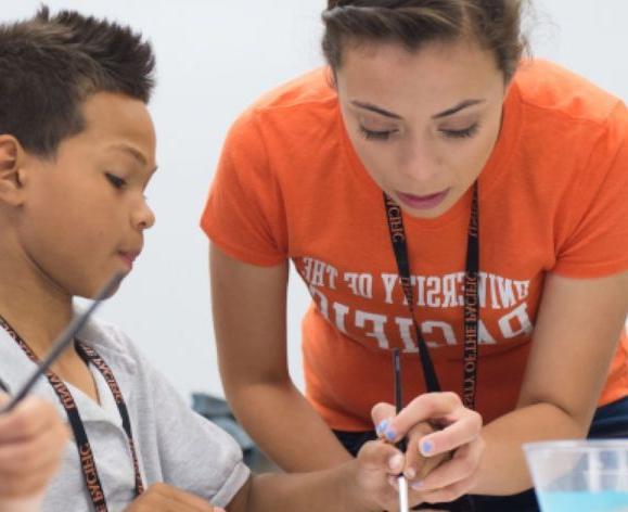 college of the Pacific student with child